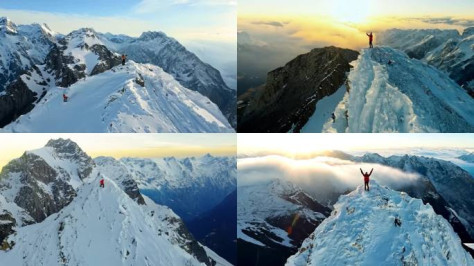 航拍雪山山峰山巅励志登山