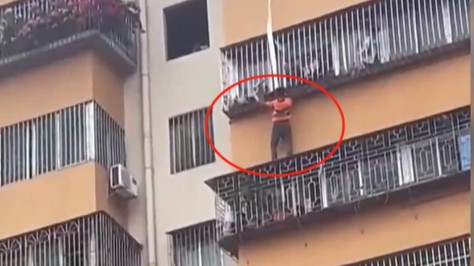 'Home alone' boy rescued after dangling by neck from window grille