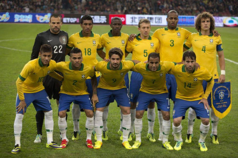 GROUP A - In this Oct. 15, 2013 file photo, Brazil soccer team poses prior to the start their international friendly soccer match against Zambia. Background from left: Diego Cavalier, Paulinho, Ramires, Lucas, Anderson Dede, and David Luiz. Foreground from left: Neymar, Dani Alves, Alexandre Pato, Lucas Moura and Maxwell.