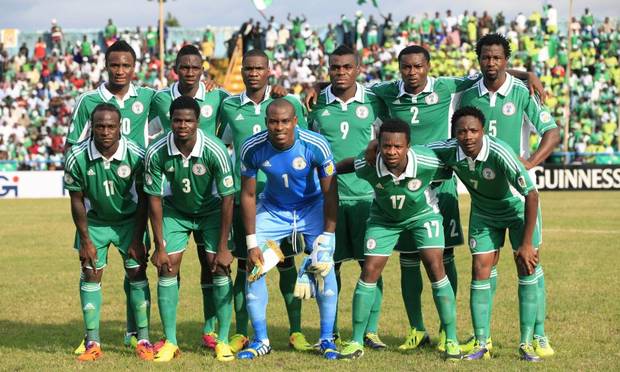 GROUP F - In this Nov. 16, 2013 file photo, Nigeria soccer team poses prior to start the World Cup qualifying match between Nigeria and Ethiopia at U. J. Esuene Stadium, in Calabar, Nigeria. Background from left: Mikel John Obi, Omeruo Kenneth, Ideye Brown, Emenike Emmanuel, Godfrey Oboabona, and Ambrose Efe. Foreground from left: Victor Moses, Echieille Elderson, Enyeama Vincent, Onazi Ogenyi, and Amhed Musa. 