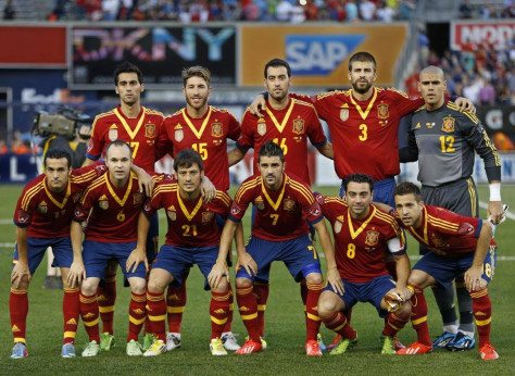 GROUP B - In this June 11, 2013 file photo, Spain soccer team poses prior to the start their international friendly soccer match against Ireland. Foreground from left, Pedro, Andres Iniesta, David Silva, Davis Villa, Xavi Hernadez, Jordi Alba. Background from left, Alvaro Arbeloa, Sergio Ramos, Sergio Busquets, Gerard Pique, Victor Valdes.