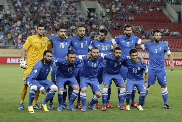 GROUP C - In this Sept. 10, 2013 file photo, Greece national soccer team poses prior to the start of a World Cup Group G qualifying soccer match between Greece and Latvia. Foreground from left: Giorgos Samaras, Vassilis Torosidis, Dimitris Salpigidis, Giannis Maniatis and Sotiris Ninis. Background from left: Orestis Karnezis, Sokratis Papastathopoulos, Kostas Mitroglou, Kostas Katsouranis, Dimitris Siovas and Giorgos Tzavelas. 