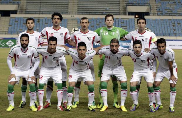 GROUP F - In this Nov. 19, 2013 file photo, Iran national team poses prior to the start the AFC Asian Cup 2015 qualifying soccer match between Lebanon and Iran. Foreground from left: Amirhossein Sadeghi, Hossein Mahini, Reza Ghoochannejhad Nournia, Ashkan Dejagah, Alireza Jahan Bakhsh and Masoud Shojaei. Background from left: Mehrdad Beitashour, Reza Haghighi, Jalal Hosseini, Mohammed Davari and Javad Nekonam. 