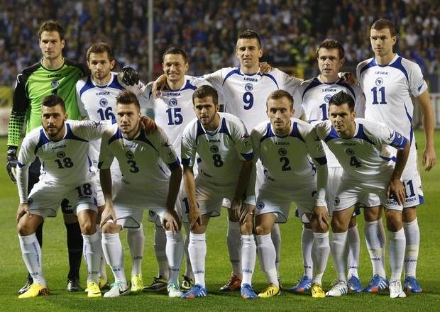 GROUP F - In this Oct. 11, 2013 file photo, Bosnia soccer team poses prior to the start the World Cup Group G qualifying soccer match between Bosnia and Liechtenstein. Background from left: Asmir Begovic, Senad Lulic, Sead Salihovic, Vedad Ibisevic, Zvjezdan Misimovic and Edin Dzeko. Foreground from left: Haris Medunjanin, Ermin Bicakcic, Miralem Pjanic, Avdija Vrsajevic and Emir Spahic. 