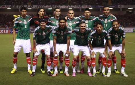 GROUP A - In this Oct. 15, 2013 file photo, Mexico's team poses prior to the start the 2014 World Cup qualifying soccer match between Costa Rica and Mexico. Background from left: Hugo Ayala, Guillermo Ochoa, Rafael Marquez, Jorge Torres, Oribe Peralta, Jesus Zavala. Foreground from left, Christian Gimenez, Carlos Pena, Miguel Layun, Javier Aquino and Javier Hernandez. 