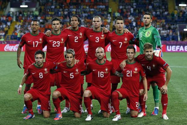 GROUP G - In this June 13, 2012 file photo, Portugal soccer team poses prior to the start the Euro 2012 soccer championship Group B match between Portugal and the Netherlands. Background from left: Nani, Helder Postiga, Bruno Alves, Pepe, Cristiano Ronaldo and Rui Patricio. Foreground from left: Joao Moutinho, Fabio Coentrao, Raul Meireles, Joao Pereira and Miguel Veloso. 